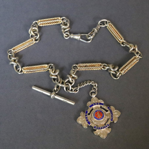 Antique sterling silver watch chain with gilt fancy links, T-bar fob and medallion. Edwardian silver Alvert chain. Double dog clips. Swivel link clasps. Salvation Army medallion. Salvation Army medal. Order of Long Service for 25 years of duty.