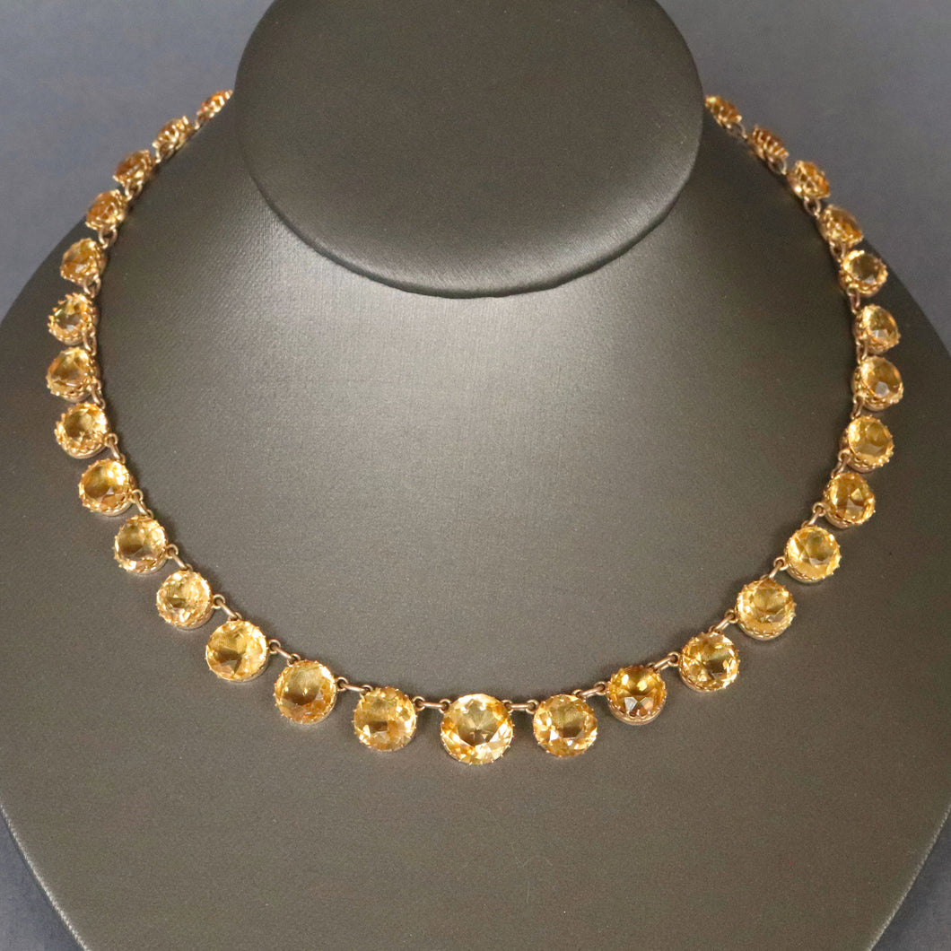 Antique Edwardian era citrine riviere necklace choker. Graduating size. Prong open back setting. 50 carat weight. Anna Wintour necklace. 