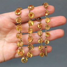 Load image into Gallery viewer, Antique Edwardian era citrine riviere necklace choker. Graduating size. Prong open back setting. 50 carat weight. Anna Wintour necklace. 
