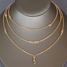 Load image into Gallery viewer, Long guard chain. Antique chain. Antique gold chain. Muff chain. Antique guard chain. Fancy link chain. Antique fancy link chain. Pierced link chain. Antique pierced link chain. Swivel clasp. Lobster clasp. Gold dog clip. Antique dog clip.  Station link chain. Station chain.
