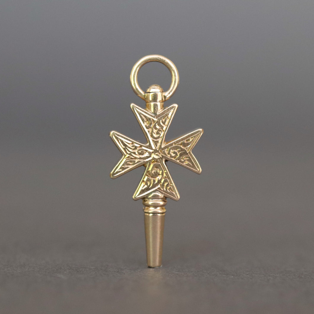 Maltese cross watch key. Gold Maltese cross watch key. Victorian watch key. Maltese cross pendant. Antique watch key. Antique gold watch key. Antique Maltese cross. Figural watch key. Gold Maltese cross. Watch key pendant. Gold cross pendant. Antique cross pendant. 