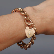 Load image into Gallery viewer, Antique gold bracelet. Antique curb link bracelet. Curb link bracelet. Chunky gold bracelet. Antique chunky gold bracelet. Heart padlock bracelet. Heart padlock. Padlock bracelet. Hollow link gold bracelet.
