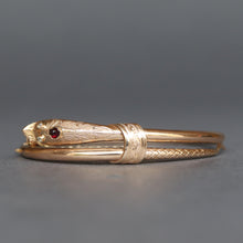 Load image into Gallery viewer, Antique snake bangle. Antique serpent bangle. Antique esclave bangle. Antique slave bangle. Gold snake bangle. Gold serpent bangle. Snake bypass bangle. Garnet snake bangle. Garnet serpent bangle. 14ct 14k gold snake serpent bangle. Engraved snake serpent bangle.
