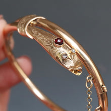 Load image into Gallery viewer, Antique snake bangle. Antique serpent bangle. Antique esclave bangle. Antique slave bangle. Gold snake bangle. Gold serpent bangle. Snake bypass bangle. Garnet snake bangle. Garnet serpent bangle. 14ct 14k gold snake serpent bangle. Engraved snake serpent bangle.
