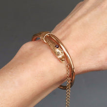 Load image into Gallery viewer, Antique snake bypass bangle with garnet in 14ct gold
