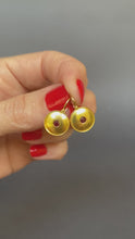 Load and play video in Gallery viewer, Vintage ruby disc drop earrings in 18ct gold
