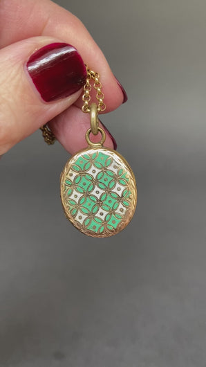 Antique blue green enamel locket. Antique enamel locket. Blue green enamel geometric locket. Victorian enamel locket. Victorian blue green enamel locket. Engraved ivy locket. Antique gold locket. Antique blue green enamel pendant. Antique enamel pendant. Victorian enamel pendant. Victorian blue green enamel pendant. Seafoam green enamel locket. Mint green enamel locket.