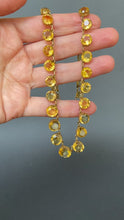 Load and play video in Gallery viewer, Antique Edwardian era citrine riviere necklace choker. Graduating size. Prong open back setting. 50 carat weight. Anna Wintour necklace. 
