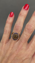 Load and play video in Gallery viewer, Antique Georgian era enamel ring with hairwork in 18ct gold
