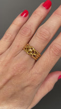 Load and play video in Gallery viewer, Antique Victorian era wide four-band knot ring in 18ct gold
