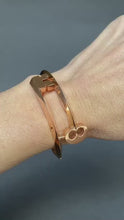 Load and play video in Gallery viewer, Vintage key shaped bypass bangle in 9ct rose gold
