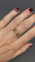 Load and play video in Gallery viewer, Antique Victorian wedding band with floral engraving in 18ct gold
