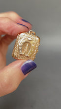 Load and play video in Gallery viewer, Antique Victorian era horseshoe locket in 14ct gold casing
