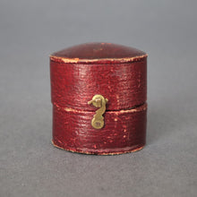 Load image into Gallery viewer, Oval shaped box. Oval shaped ring box. Antique ring box. Antique ring box. Vintage oval shaped ring box. Antique leather ring box. Leather ring box. Red leather ring box. Antique red ring box. Burgundy leather ring box. Antique burgundy leather ring box.
