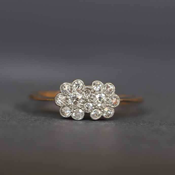 Vintage ring. Daisy ring. Double daisy ring. Double daisy. Cluster ring. Double cluster ring. Double cluster. Toi et moi ring. You and me ring. Flower ring. Diamond cluster ring. Diamond daisy ring. Diamond flower ring. Vintage cluster ring. Vintage flower ring. Vintage daisy ring. Edwardian daisy ring. Edwardian ring. Antique ring. Antique flower ring. Antique cluster ring. Antique daisy ring. Engagement ring. Diamond engagement ring. Vintage engagement ring. Antique engagement ring.