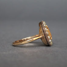 Load image into Gallery viewer, Antique Georgian brown topaz ring with pearl halo in 9ct gold
