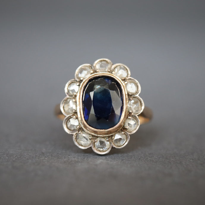 Antique sapphire ring. Antique cluster ring. Antique halo ring. Blue sapphire ring. Antique diamond halo ring. Antique diamond cluster ring.