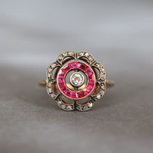 Load image into Gallery viewer, Antique flower ring. Antique ruby ring. Antique ruby and diamond ring. Art deco ruby ring. Antique target ring. Antique cluster ring. Antique halo ring. Art deco halo ring. Art deco target ring. 
