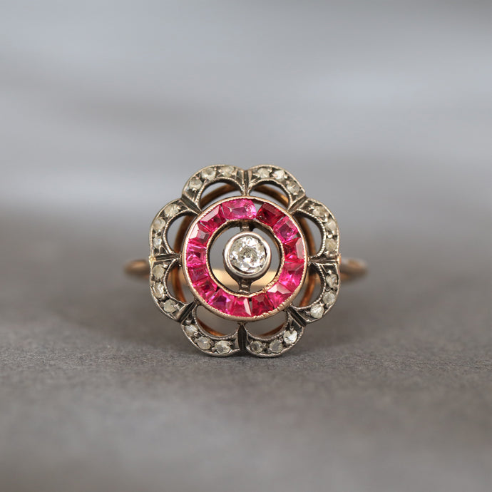 Antique flower ring. Antique ruby ring. Antique ruby and diamond ring. Art deco ruby ring. Antique target ring. Antique cluster ring. Antique halo ring. Art deco halo ring. Art deco target ring. 