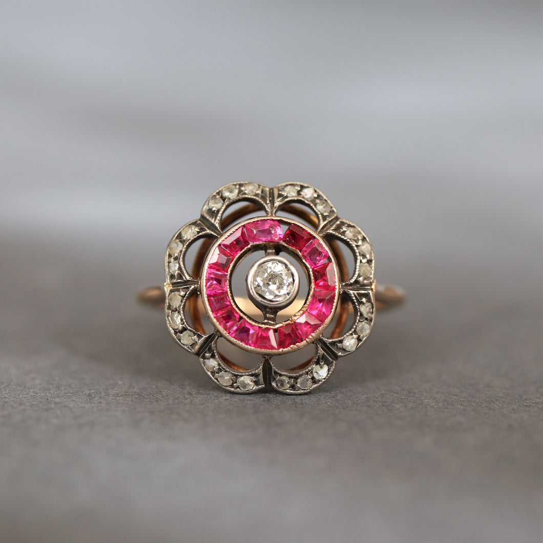 Antique flower ring. Antique ruby ring. Antique ruby and diamond ring. Art deco ruby ring. Antique target ring. Antique cluster ring. Antique halo ring. Art deco halo ring. Art deco target ring. 