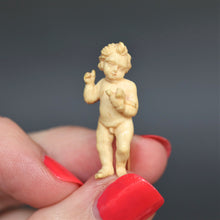 Load image into Gallery viewer, Antique putti. Antique cherub. Antique angel. Putti pin. Ivory putti pin. Cherub pin. Ivory cherub pin. Angel pin. Ivory angel pin. Cherub and dove. Putti and dove. Carved ivory pin. Antique ivory pin. 
