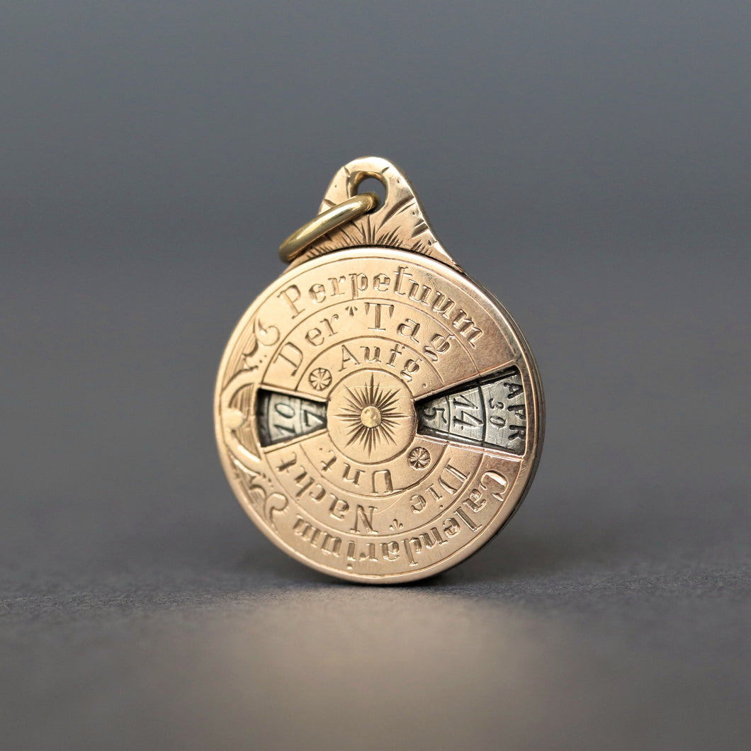 Antique Victorian era perpetual calendar pendant in 14ct gold