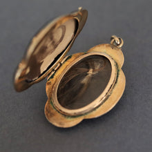 Load image into Gallery viewer, Antique Victorian enamel &amp; ruby mourning locket in 14ct gold
