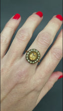 Load and play video in Gallery viewer, Antique Georgian brown topaz ring with pearl halo in 9ct gold
