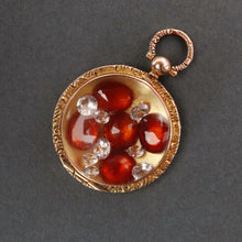 Load image into Gallery viewer, Antique Edwardian era locket in 9ct gold with garnets &amp; sapphires
