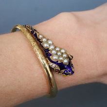 Load image into Gallery viewer, Antique Victorian era pearl, garnet &amp; enamel snake bangle in 14ct gold
