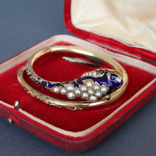 Load image into Gallery viewer, Antique Victorian era pearl, garnet &amp; enamel snake bangle in 14ct gold
